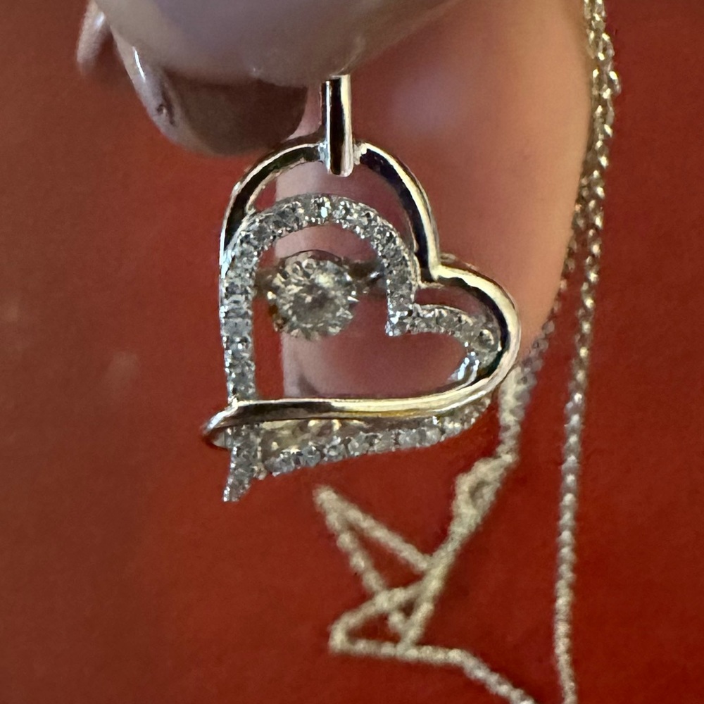 10k white gold diamond heart necklace.